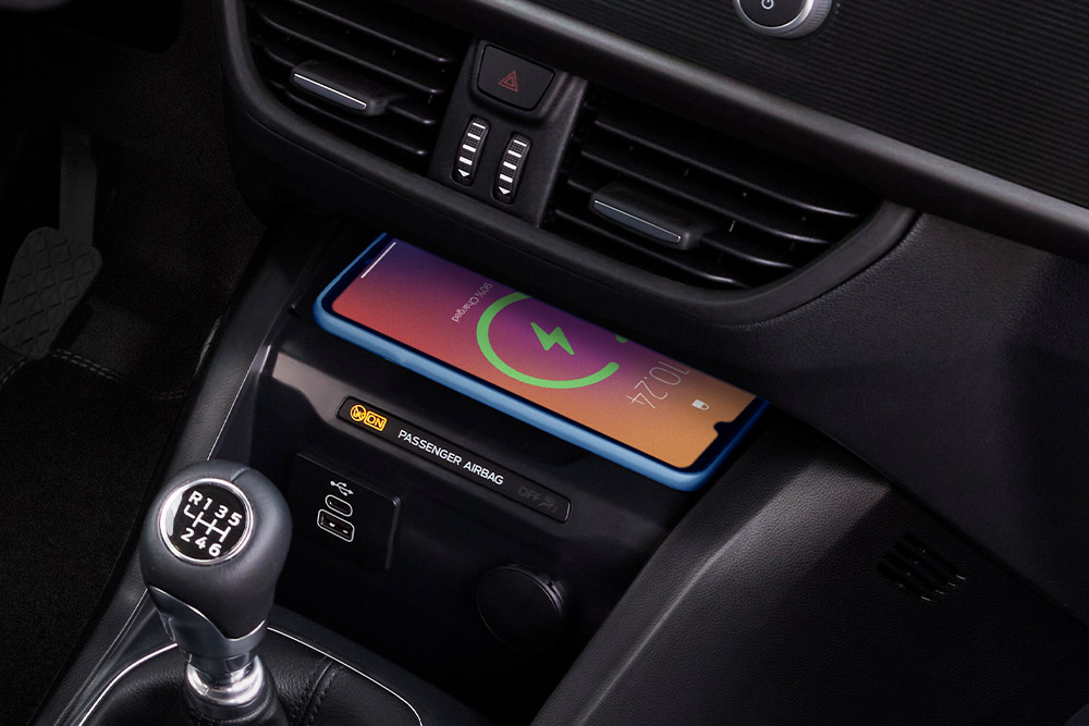 Wireless charging charging a phone in the New Ford Transit Courier